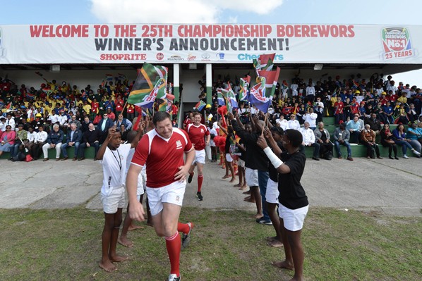 Bakkies Botha leads the Braai Legends onto the field for a friendly touch rugby charity match in aid of VUSA Academy